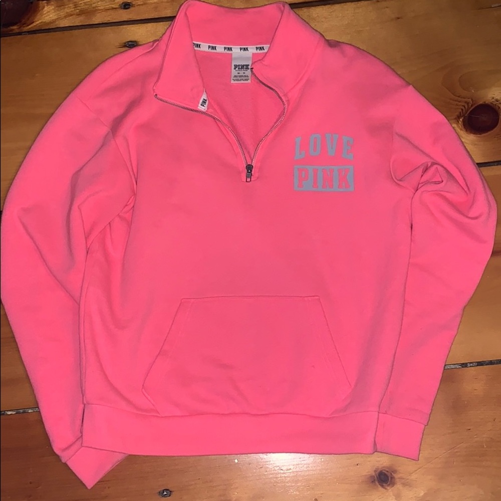 Only worn a few times. PINK SWEATSHIRT